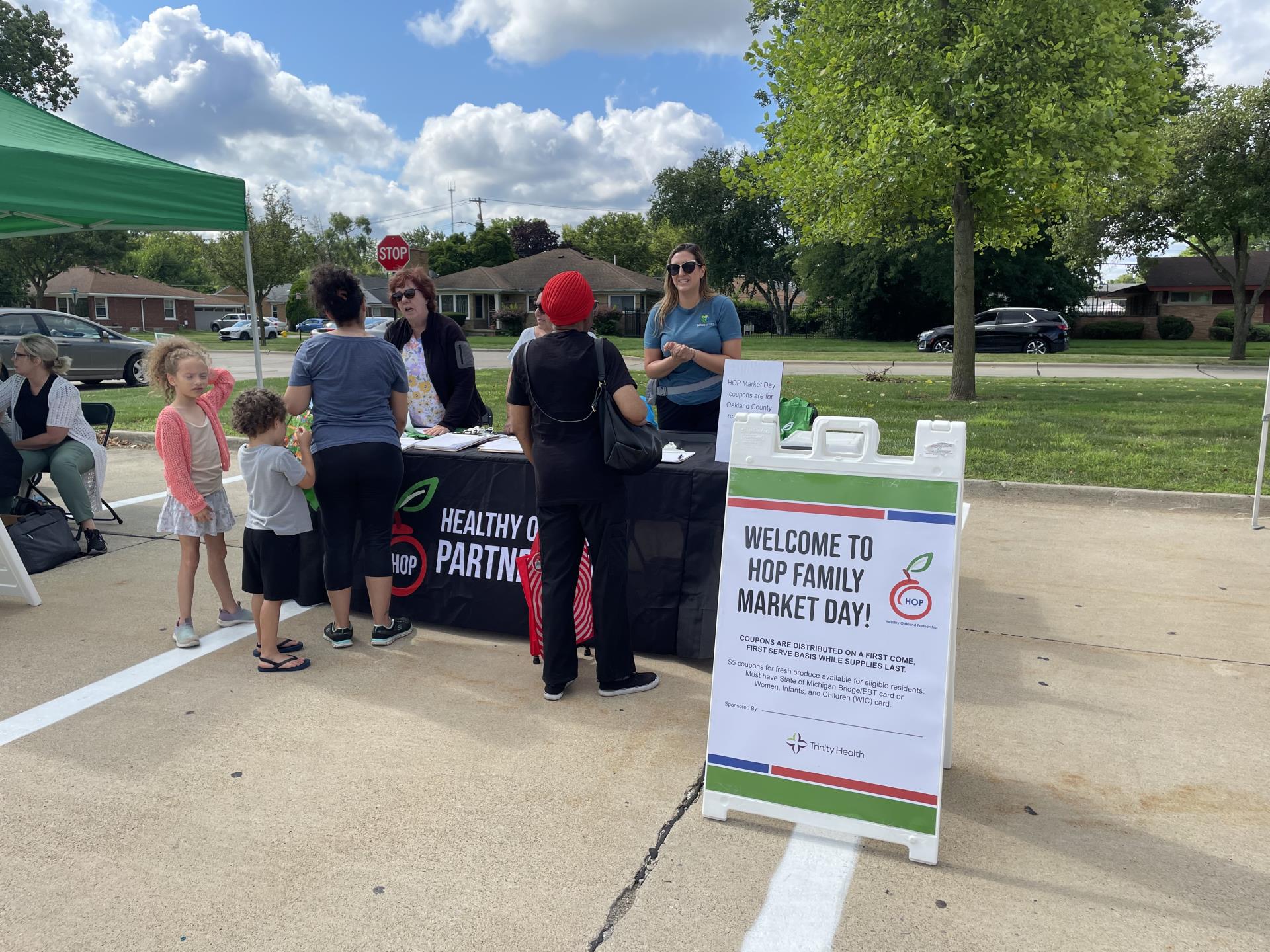 People standing at an information table